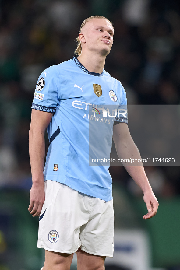 Erling Haaland of Manchester City reacts after missing a penalty kick during the UEFA Champions League match between Sporting CP and Manches...