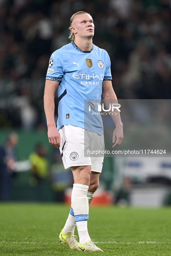 Erling Haaland of Manchester City reacts after missing a penalty kick during the UEFA Champions League match between Sporting CP and Manches...