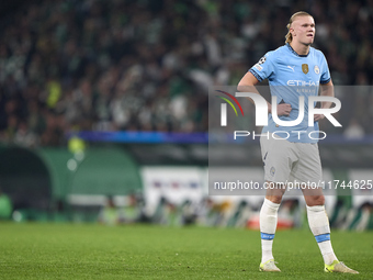 Erling Haaland of Manchester City reacts after missing a penalty kick during the UEFA Champions League match between Sporting CP and Manches...