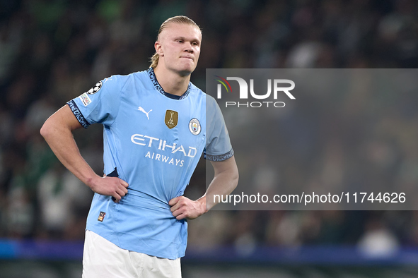 Erling Haaland of Manchester City reacts after missing a penalty kick during the UEFA Champions League match between Sporting CP and Manches...