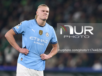 Erling Haaland of Manchester City reacts after missing a penalty kick during the UEFA Champions League match between Sporting CP and Manches...