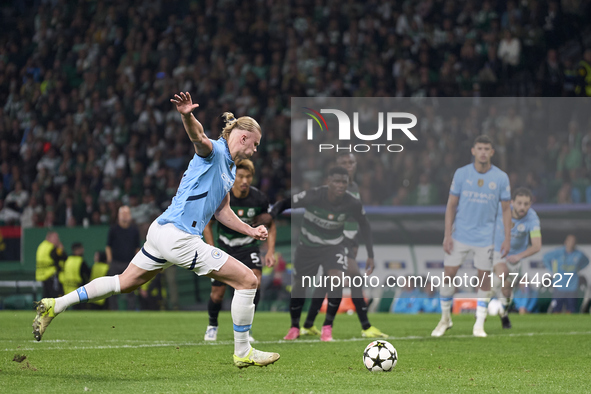 Erling Haaland of Manchester City takes a penalty kick during the UEFA Champions League match between Sporting CP and Manchester City at Jos...