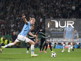 Erling Haaland of Manchester City takes a penalty kick during the UEFA Champions League match between Sporting CP and Manchester City at Jos...