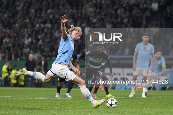 Erling Haaland of Manchester City takes a penalty kick during the UEFA Champions League match between Sporting CP and Manchester City at Jos...