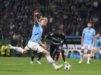 Erling Haaland of Manchester City takes a penalty kick during the UEFA Champions League match between Sporting CP and Manchester City at Jos...