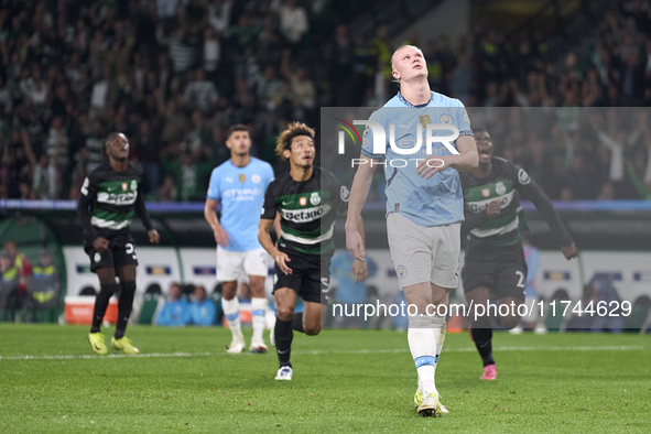 Erling Haaland of Manchester City reacts after missing a penalty kick during the UEFA Champions League match between Sporting CP and Manches...