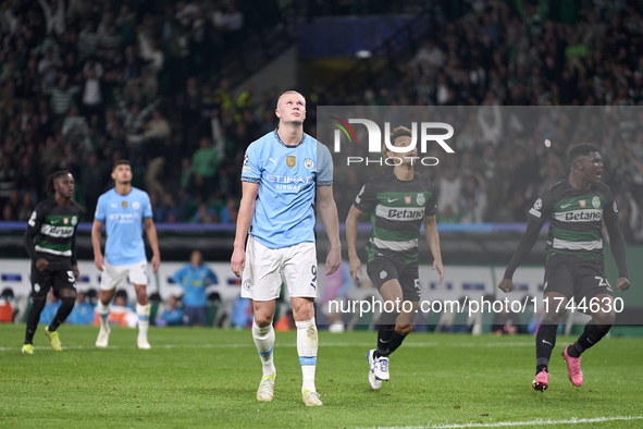 Erling Haaland of Manchester City reacts after missing a penalty kick during the UEFA Champions League match between Sporting CP and Manches...