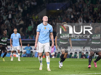 Erling Haaland of Manchester City reacts after missing a penalty kick during the UEFA Champions League match between Sporting CP and Manches...