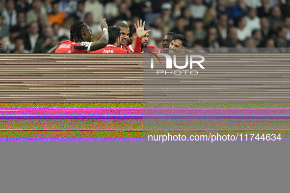 Tijjani Reijnders central midfield of AC Milan and Netherlands celebrates after scoring his sides first goal during the UEFA Champions Leagu...