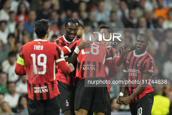 Tijjani Reijnders central midfield of AC Milan and Netherlands celebrates after scoring his sides first goal during the UEFA Champions Leagu...