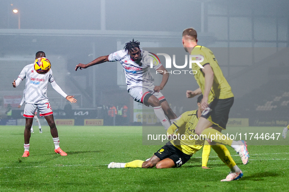 The shot by #29, Tola Showunmi of Crawley Town, is blocked during the Sky Bet League 1 match between Burton Albion and Crawley Town at the P...