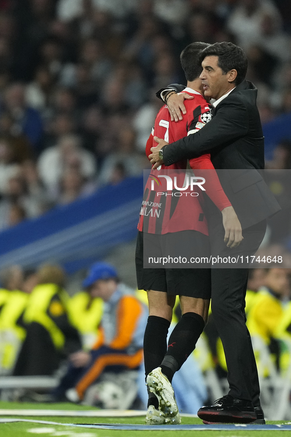 Alvaro Morata centre-forward of AC Milan and Spain and Paulo Fonseca head coach of AC Milan greets each other during the UEFA Champions Leag...