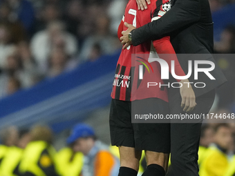 Alvaro Morata centre-forward of AC Milan and Spain and Paulo Fonseca head coach of AC Milan greets each other during the UEFA Champions Leag...