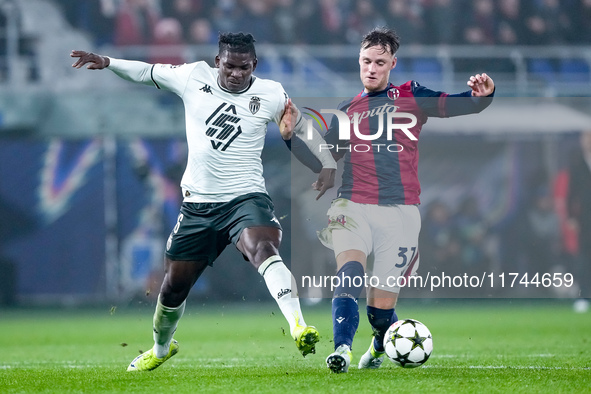 Breel Embolo of AS Monaco and Sam Beukema of Bologna FC compete for the ball during the UEFA Champions League 2024/25 League Phase MD4 match...