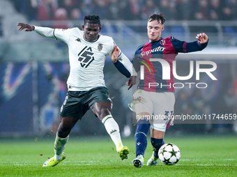 Breel Embolo of AS Monaco and Sam Beukema of Bologna FC compete for the ball during the UEFA Champions League 2024/25 League Phase MD4 match...