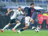 Dan Ndoye of Bologna FC and Vanderson of AS Monaco compete for the ball during the UEFA Champions League 2024/25 League Phase MD4 match betw...