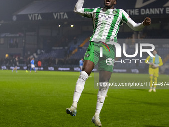 Beryly Lubala #30 of Wycombe Wanderers F.C. celebrates at full time during the Sky Bet League 1 match between Stockport County and Wycombe W...