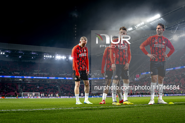 PSV Eindhoven defender Matteo Dams and PSV Eindhoven forward Luuk de Jong participate in the match between PSV and Girona at the Philips Sta...