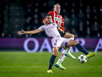 Girona FC defender Miguel Gutierrez and PSV Eindhoven defender Rick Karsdorp play during the match between PSV and Girona at the Philips Sta...