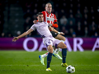 Girona FC defender Miguel Gutierrez and PSV Eindhoven defender Rick Karsdorp play during the match between PSV and Girona at the Philips Sta...