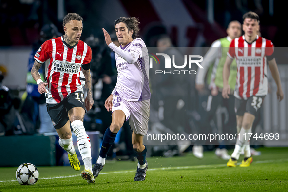 PSV Eindhoven forward Noa Lang and Girona FC forward Bryan Gil play during the match between PSV and Girona at the Philips Stadium for the U...