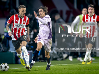 PSV Eindhoven forward Noa Lang and Girona FC forward Bryan Gil play during the match between PSV and Girona at the Philips Stadium for the U...