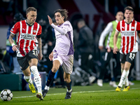 PSV Eindhoven forward Noa Lang and Girona FC forward Bryan Gil play during the match between PSV and Girona at the Philips Stadium for the U...