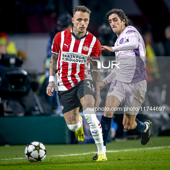 PSV Eindhoven forward Noa Lang and Girona FC forward Bryan Gil play during the match between PSV and Girona at the Philips Stadium for the U...