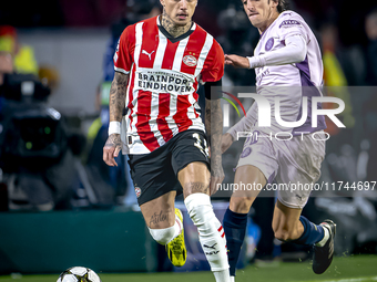 PSV Eindhoven forward Noa Lang and Girona FC forward Bryan Gil play during the match between PSV and Girona at the Philips Stadium for the U...