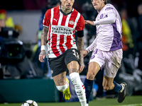 PSV Eindhoven forward Noa Lang and Girona FC forward Bryan Gil play during the match between PSV and Girona at the Philips Stadium for the U...