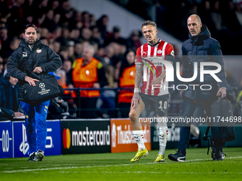 PSV Eindhoven forward Noa Lang becomes injured and leaves the pitch during the match between PSV and Girona at the Philips Stadium for the U...