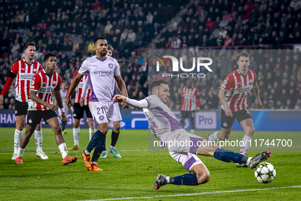 Girona FC defender Arnau Martinez participates in the match between PSV and Girona at the Philips Stadium for the UEFA Champions League - Le...