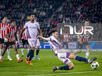 Girona FC defender Arnau Martinez participates in the match between PSV and Girona at the Philips Stadium for the UEFA Champions League - Le...