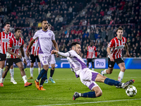 Girona FC defender Arnau Martinez participates in the match between PSV and Girona at the Philips Stadium for the UEFA Champions League - Le...