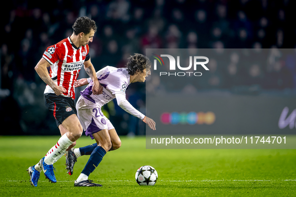 PSV Eindhoven defender Olivier Boscagli and Girona FC forward Bryan Gil participate in the match between PSV and Girona at the Philips Stadi...