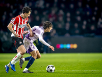 PSV Eindhoven defender Olivier Boscagli and Girona FC forward Bryan Gil participate in the match between PSV and Girona at the Philips Stadi...