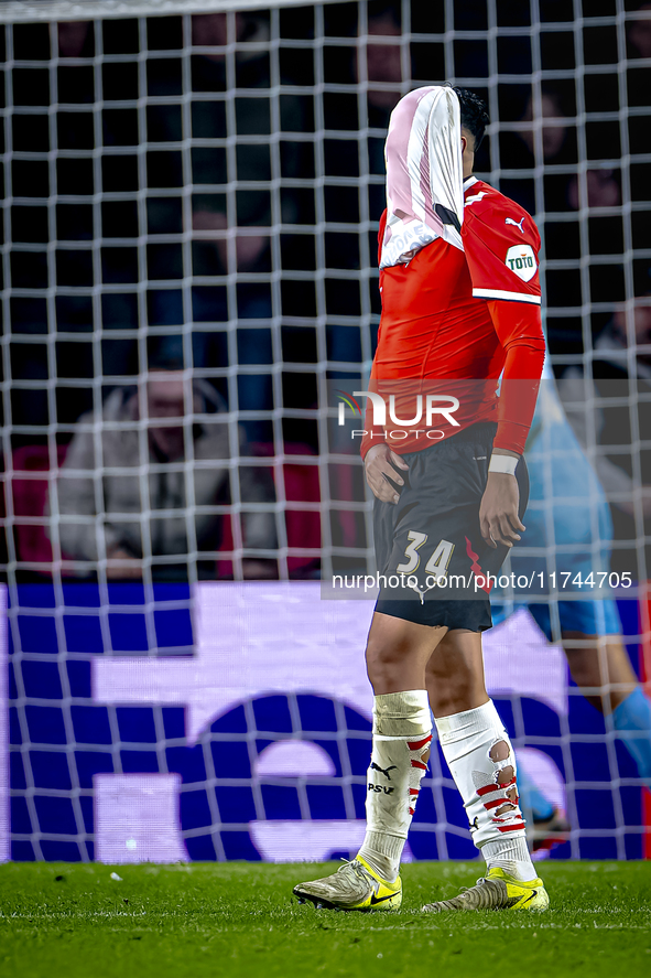 PSV Eindhoven midfielder Ismael Saibari appears dejected after a missed chance during the match between PSV and Girona at the Philips Stadiu...