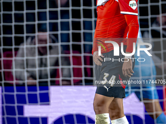 PSV Eindhoven midfielder Ismael Saibari appears dejected after a missed chance during the match between PSV and Girona at the Philips Stadiu...