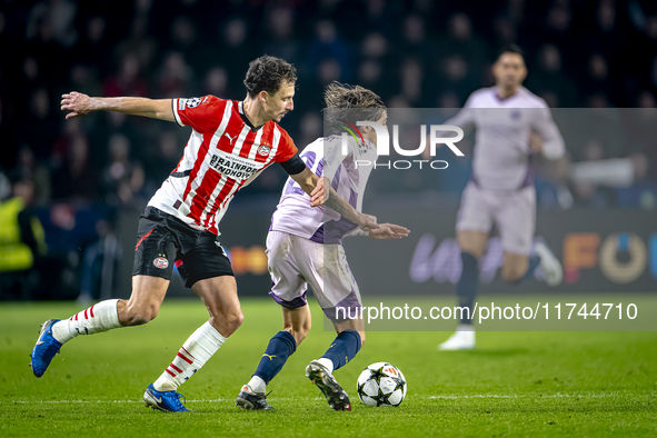 PSV Eindhoven defender Olivier Boscagli and Girona FC forward Bryan Gil participate in the match between PSV and Girona at the Philips Stadi...