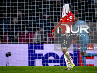 PSV Eindhoven midfielder Ismael Saibari appears dejected after a missed chance during the match between PSV and Girona at the Philips Stadiu...