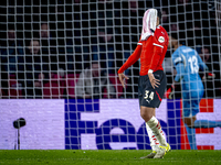 PSV Eindhoven midfielder Ismael Saibari appears dejected after a missed chance during the match between PSV and Girona at the Philips Stadiu...