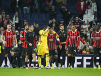 Milan players celebrate victory after the UEFA Champions League 2024/25 League Phase MD4 match between Real Madrid C.F. and AC Milan at Esta...