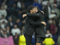 Paulo Fonseca head coach of AC Milan and Alvaro Morata centre-forward of AC Milan and Spain celebrate victory after the UEFA Champions Leagu...