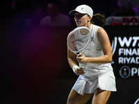 RIYADH, SAUDI ARABIA - NOVEMBER 05: Iga Swiatek of Poland during her match against Coco Gauff of USA, on day 4 of the 2024 WTA Finals, part...