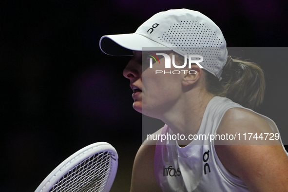 RIYADH, SAUDI ARABIA - NOVEMBER 05: Iga Swiatek of Poland during her match against Coco Gauff of USA, on day 4 of the 2024 WTA Finals, part...