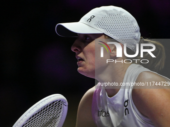 RIYADH, SAUDI ARABIA - NOVEMBER 05: Iga Swiatek of Poland during her match against Coco Gauff of USA, on day 4 of the 2024 WTA Finals, part...