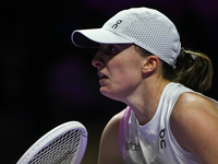 RIYADH, SAUDI ARABIA - NOVEMBER 05: Iga Swiatek of Poland during her match against Coco Gauff of USA, on day 4 of the 2024 WTA Finals, part...