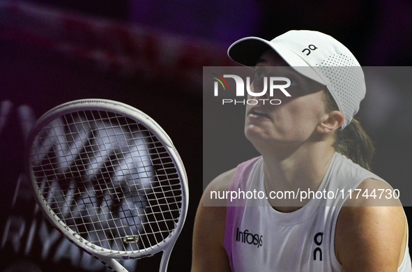 RIYADH, SAUDI ARABIA - NOVEMBER 05: Iga Swiatek of Poland during her match against Coco Gauff of USA, on day 4 of the 2024 WTA Finals, part...