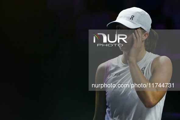 RIYADH, SAUDI ARABIA - NOVEMBER 05: Iga Swiatek of Poland during her match against Coco Gauff of USA, on day 4 of the 2024 WTA Finals, part...