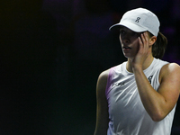 RIYADH, SAUDI ARABIA - NOVEMBER 05: Iga Swiatek of Poland during her match against Coco Gauff of USA, on day 4 of the 2024 WTA Finals, part...